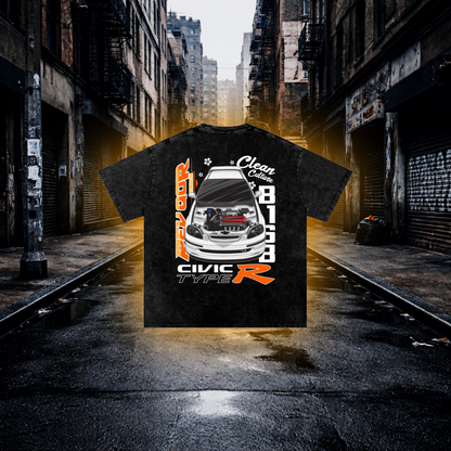 Black t-shirt with car graphic design in an urban alleyway