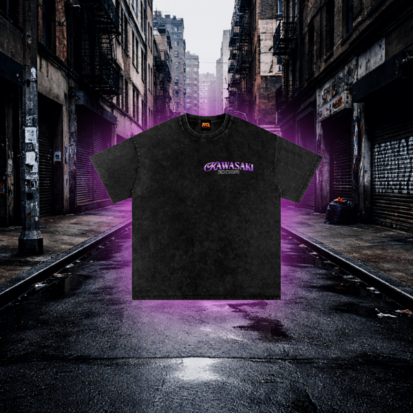 Black t-shirt with 'Kawasaki' logo on a dark alleyway background