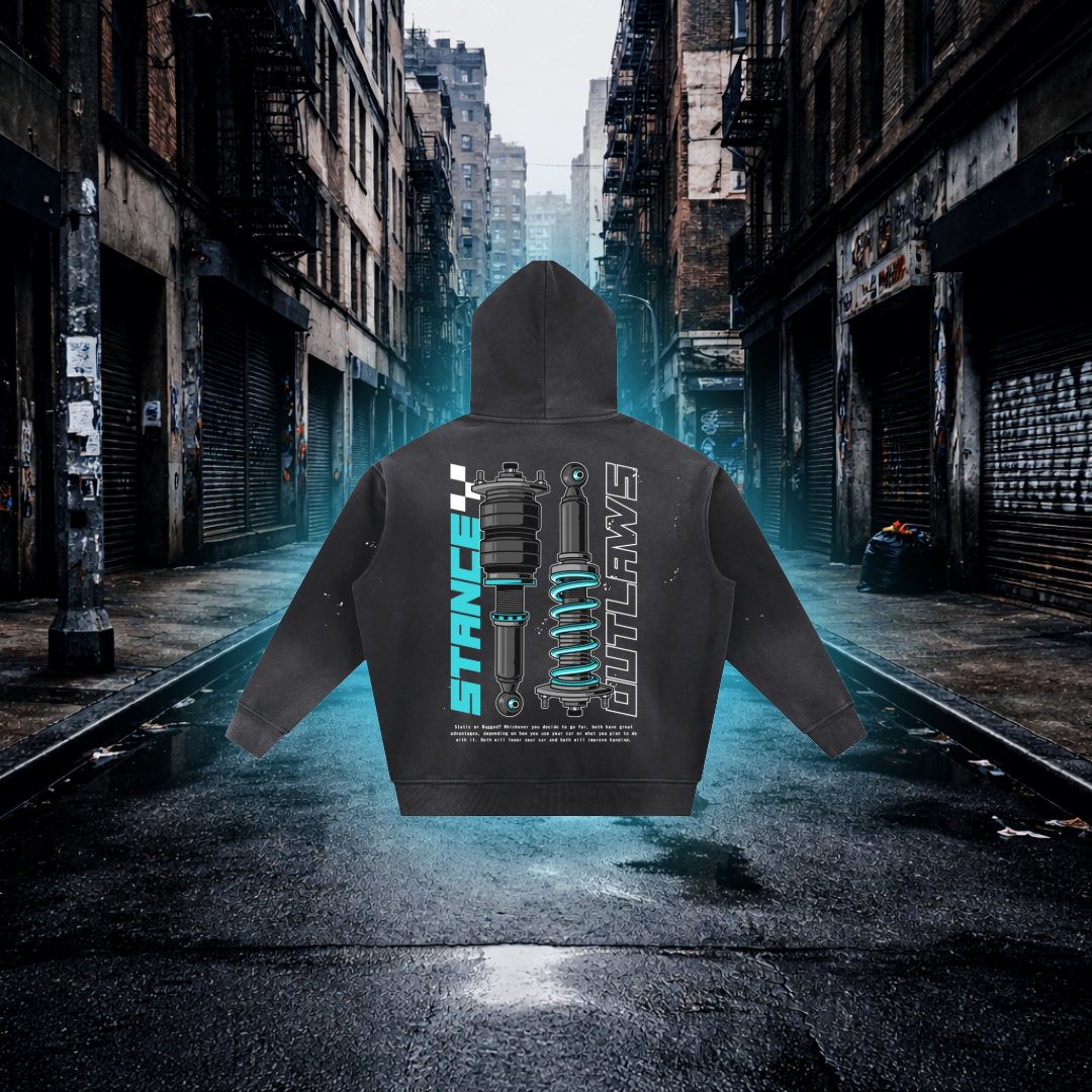 Hoodie with "Stance Outlaws" text and a graphic on the back in an urban alleyway Blue Stance Outlaws Hoodie – Premium Automotive Streetwear Hoodie
