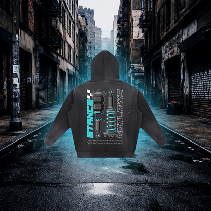 Hoodie with "Stance Outlaws" text and a graphic on the back in an urban alleyway Blue Stance Outlaws Hoodie – Premium Automotive Streetwear Hoodie