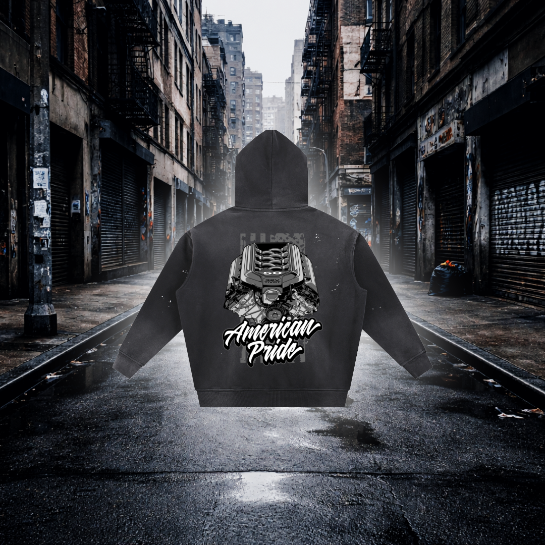 Hoodie with 'American Pride' text and a V8 Engine in an urban alleyway V8 Engine Inspired American Pride Hoodie – Premium Car Streetwear Hoodie