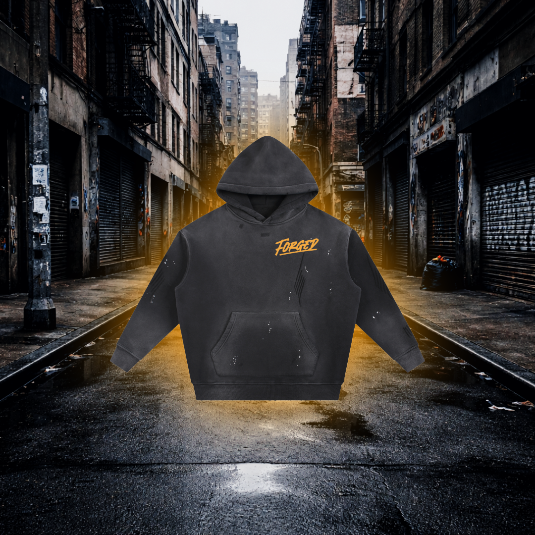 Black hoodie with yellow 'FORGED' text on the chest on an Urban background Forged Wheels Inspired Hoodie – Premium Automotive Streetwear Hoodie