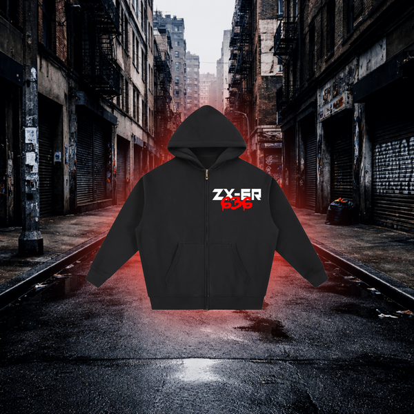 Black hoodie with red and white text on a dark alleyway background Fuel Stop Oversized Zip Hoodie – Premium Sportbike Streetwear Hoodie