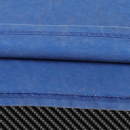 Premium T-Shirt Close-up of blue fabric with carbon fiber pattern underneath